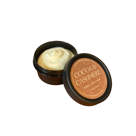 Open 50g Cocoa & Cashmere body butter showing its creamy texture