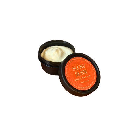 Open 50g Slow Burn body butter showing its creamy texture