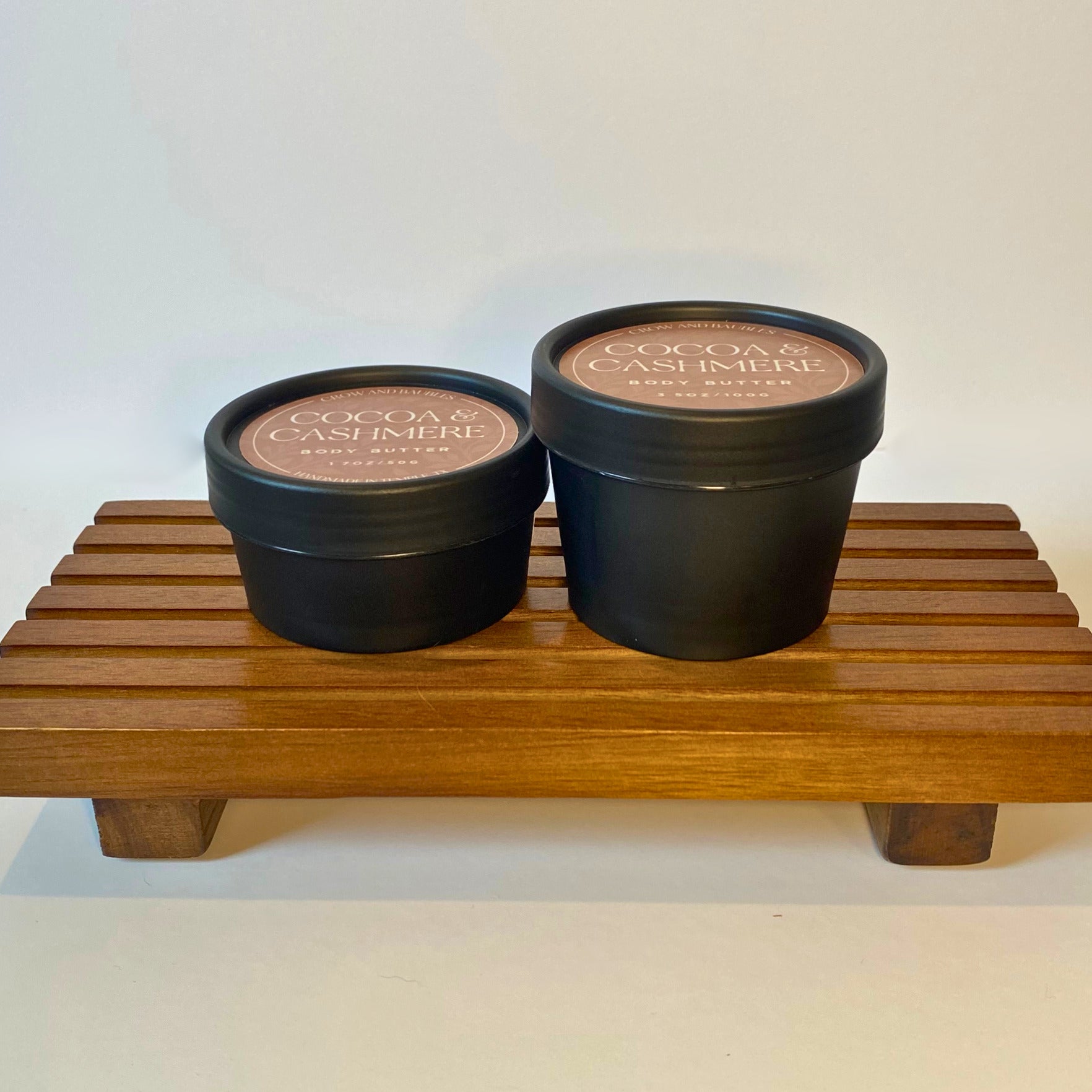 Cocoa & Cashmere body butter in 50g and 100g sizes, shown side by side for size comparison