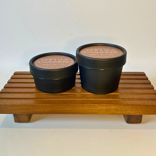 Cocoa & Cashmere body butter in 50g and 100g sizes, shown side by side for size comparison
