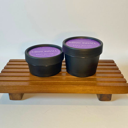 Mirrorball body butter in 50g and 100g sizes, shown side by side for size comparison