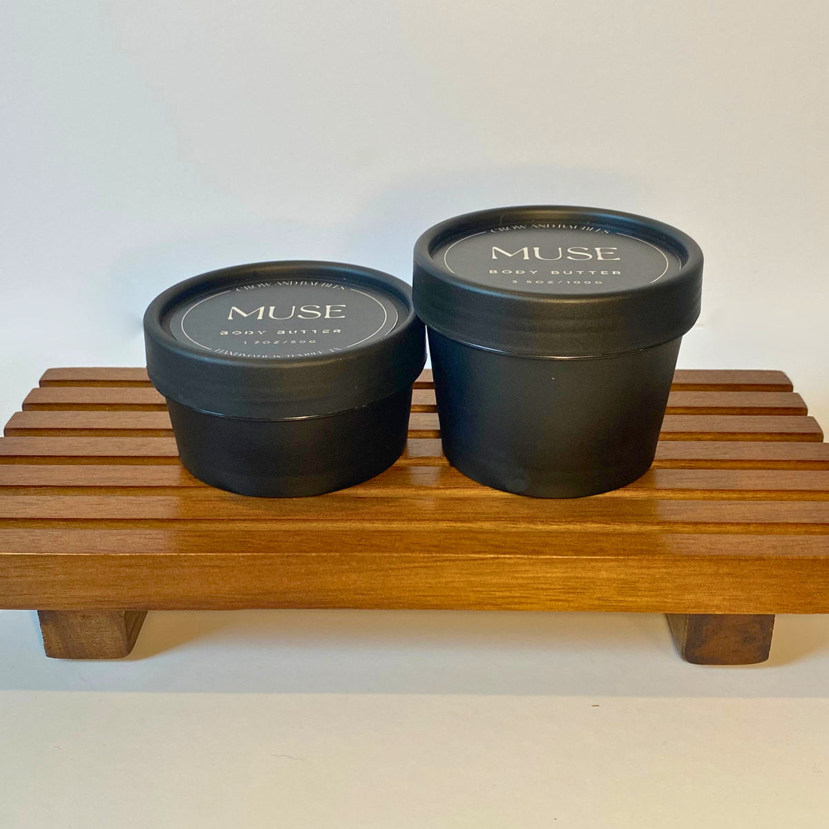 Muse body butter in 50g and 100g sizes, shown side by side for size comparison