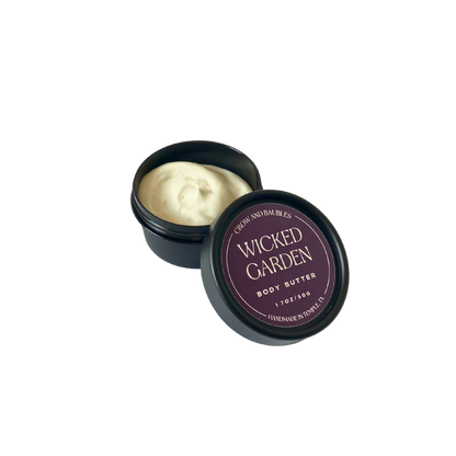 Wicked Garden 50g body butter, open to display creamy texture